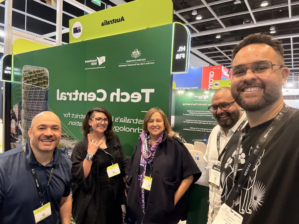 The team smiling at the Australia Tech Central stand at LEAP EAST in Hong Kong.